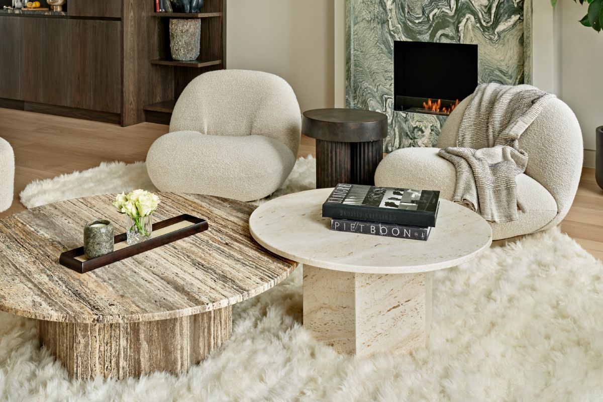 Chic London Drawing Room with Gubi chairs in front of fireplace. 