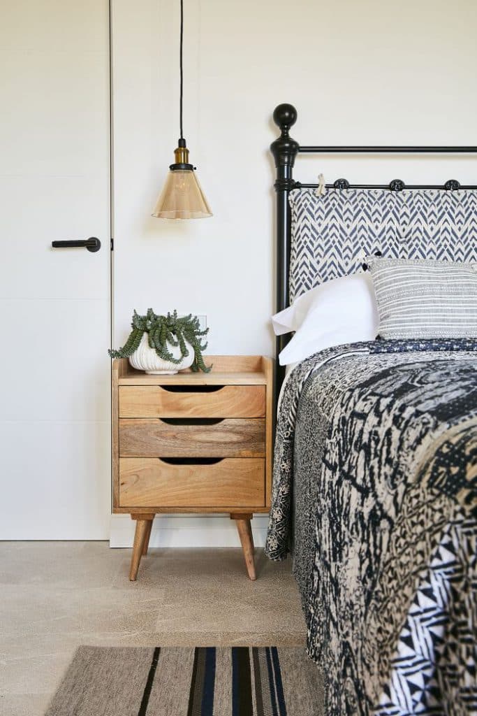 Wooden bedside table in coastal Mallorcan Villa