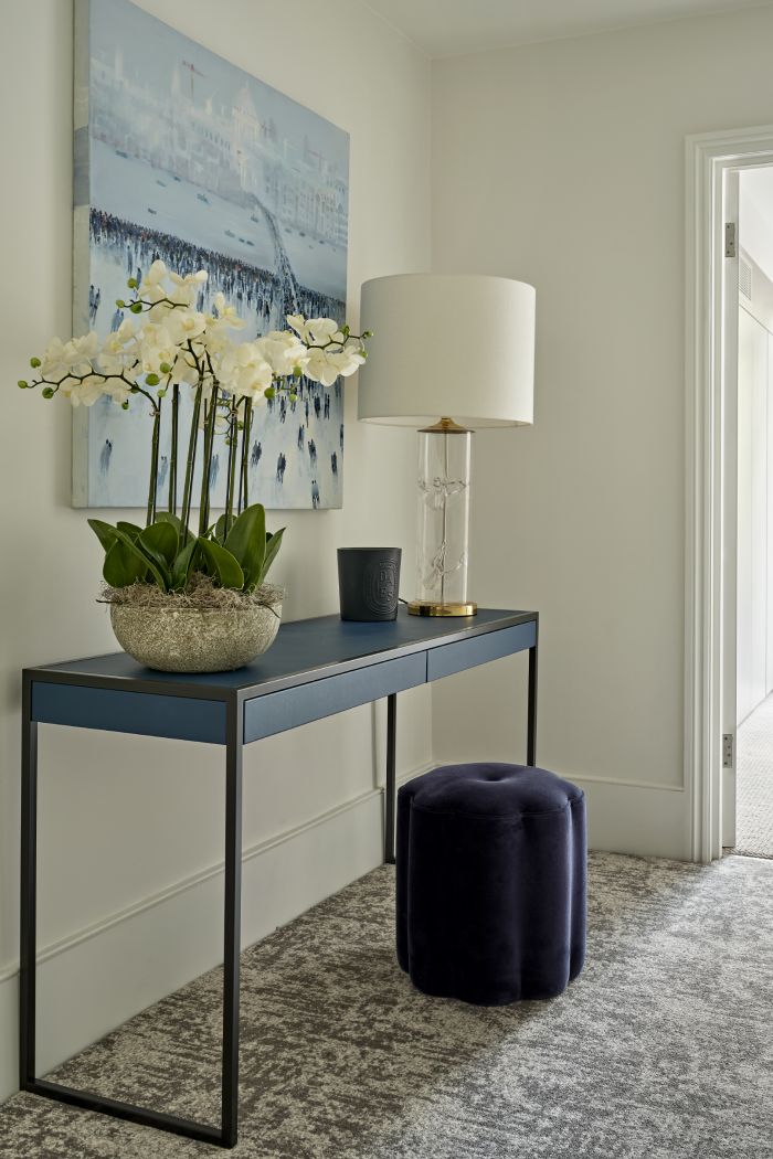 Console desk area on staircase landing. 