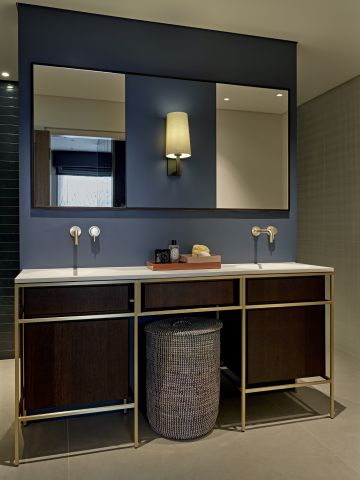 Blue ensuite bathroom for principle bedroom.