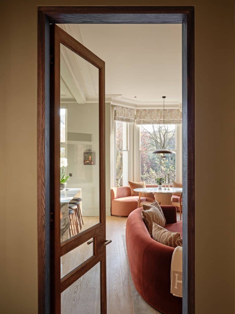 Entry from hallway to the living room in central London apartment.