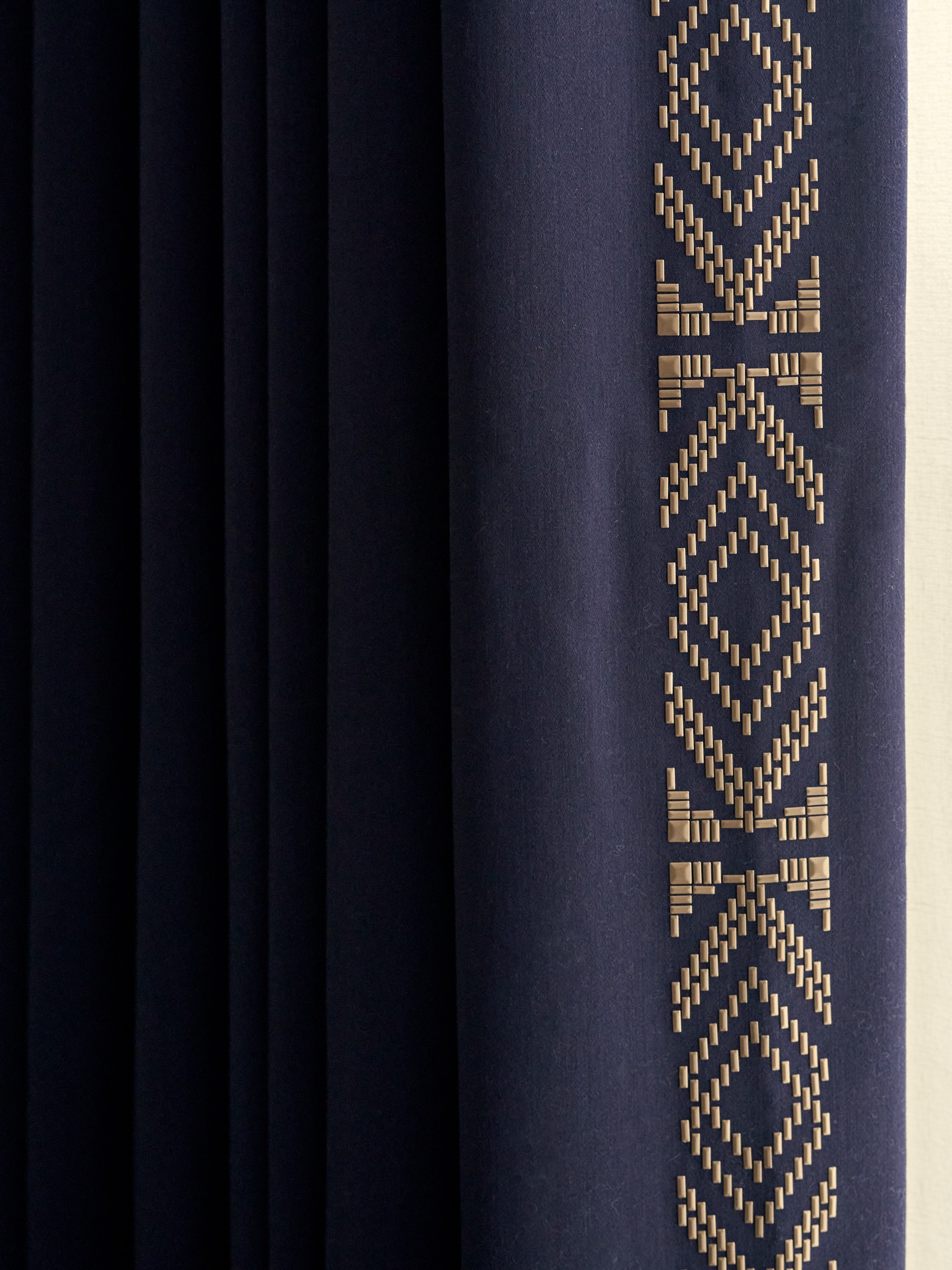 Elegant heat applied beads to lead edge of curtains.